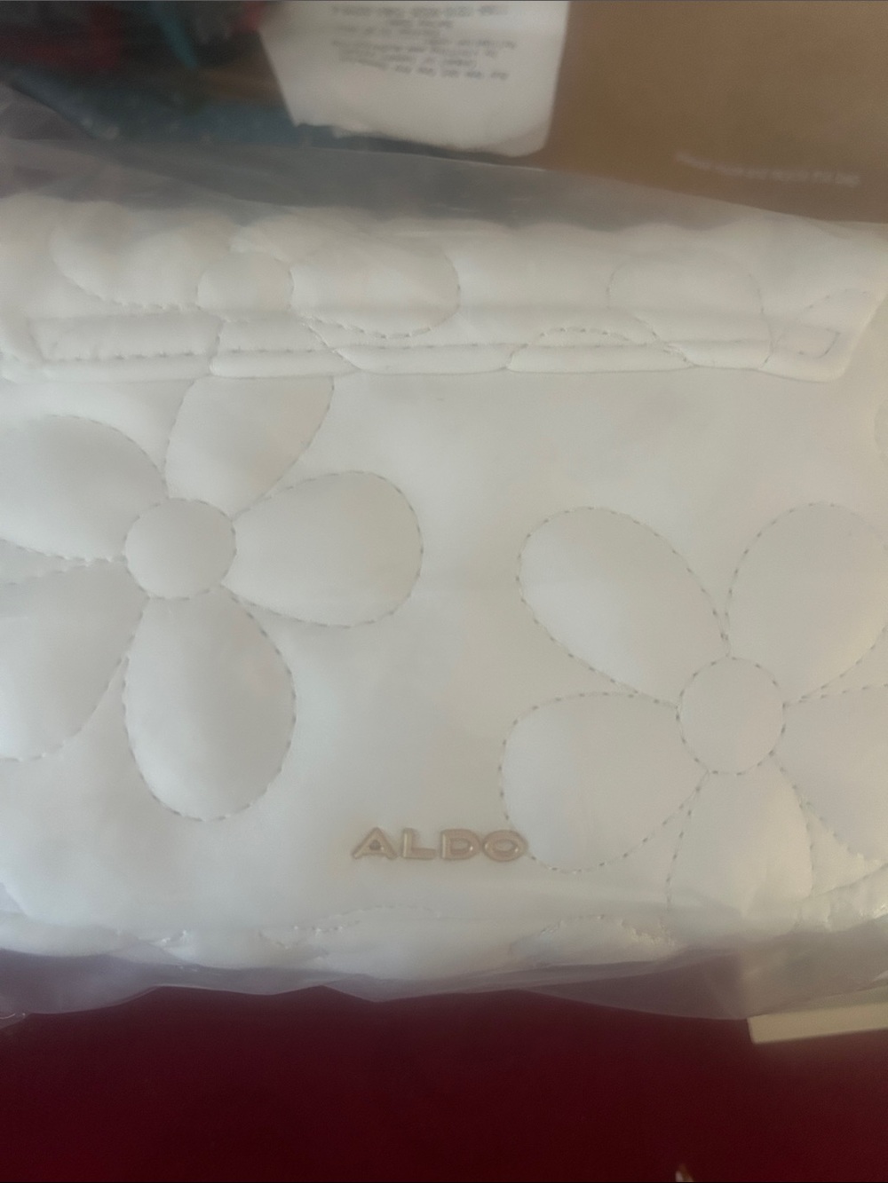 ALDO White Quilted Floral Clutch with Gold Logo